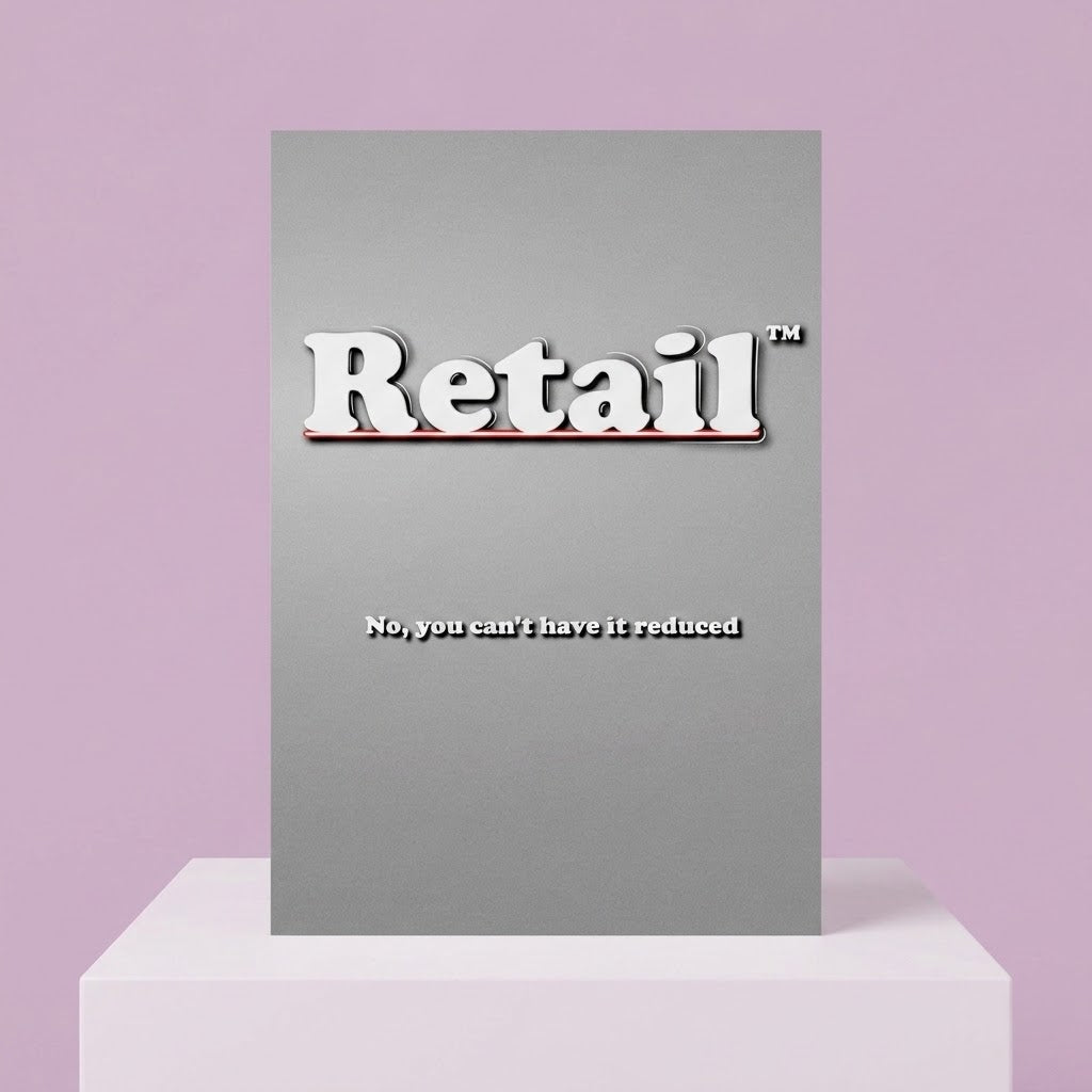 A gray rectangular sign or poster with the word 'Retail' in large white letters and the phrase 'No, you can't have it reduced' below it, displayed on a white pedestal against a light purple background.